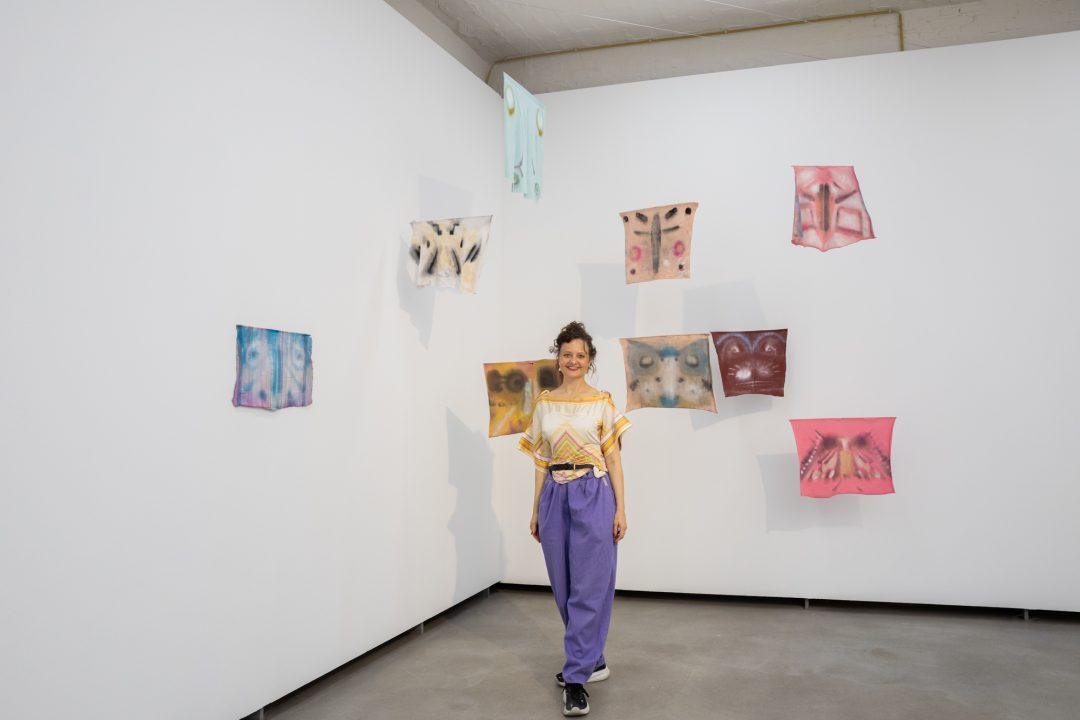 Artist Madeleine Kelly before her work Collect, collect! Gather, Berlin